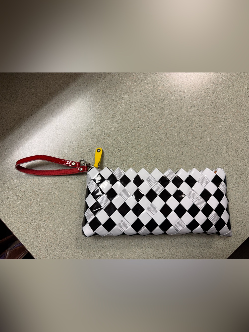 Nahui Ollin Black and White Checkered Wristlet with Red Strap